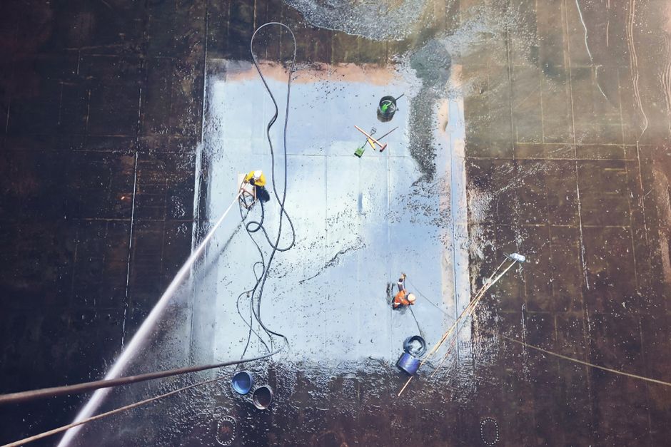 Close-up of chic kitchen cleaning essentials on a stylish countertop.
